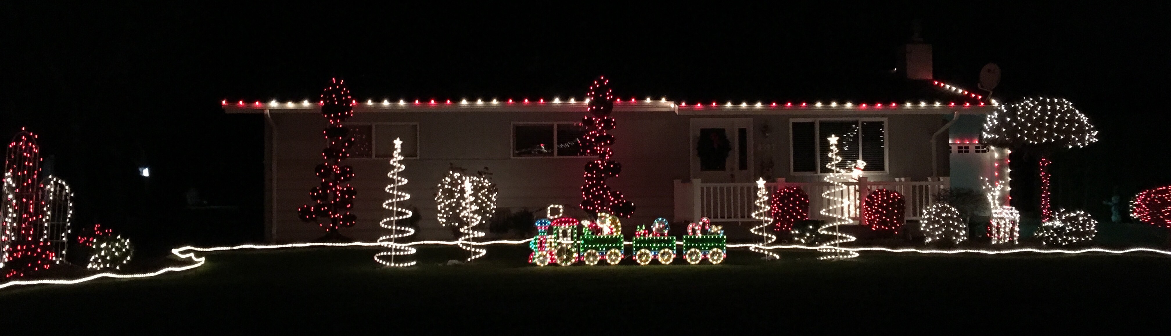 Red-and-white themed Christmas lit home on Depot Road, just south of LTI.