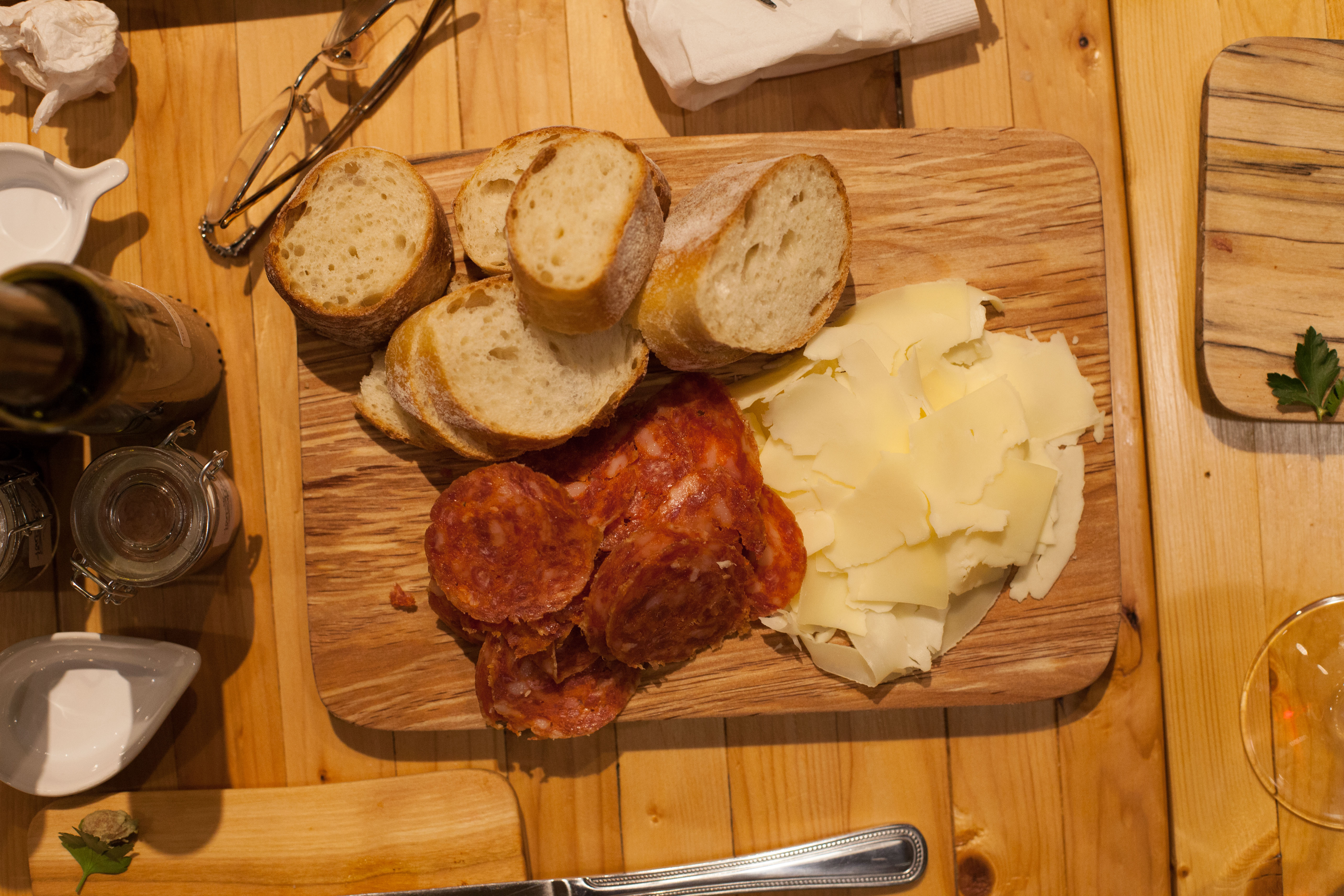 A meat and cheese 'Drizzle Board' from Overflow Taps neighbor, which can be enjoyed with a drink and friends at Overflow.