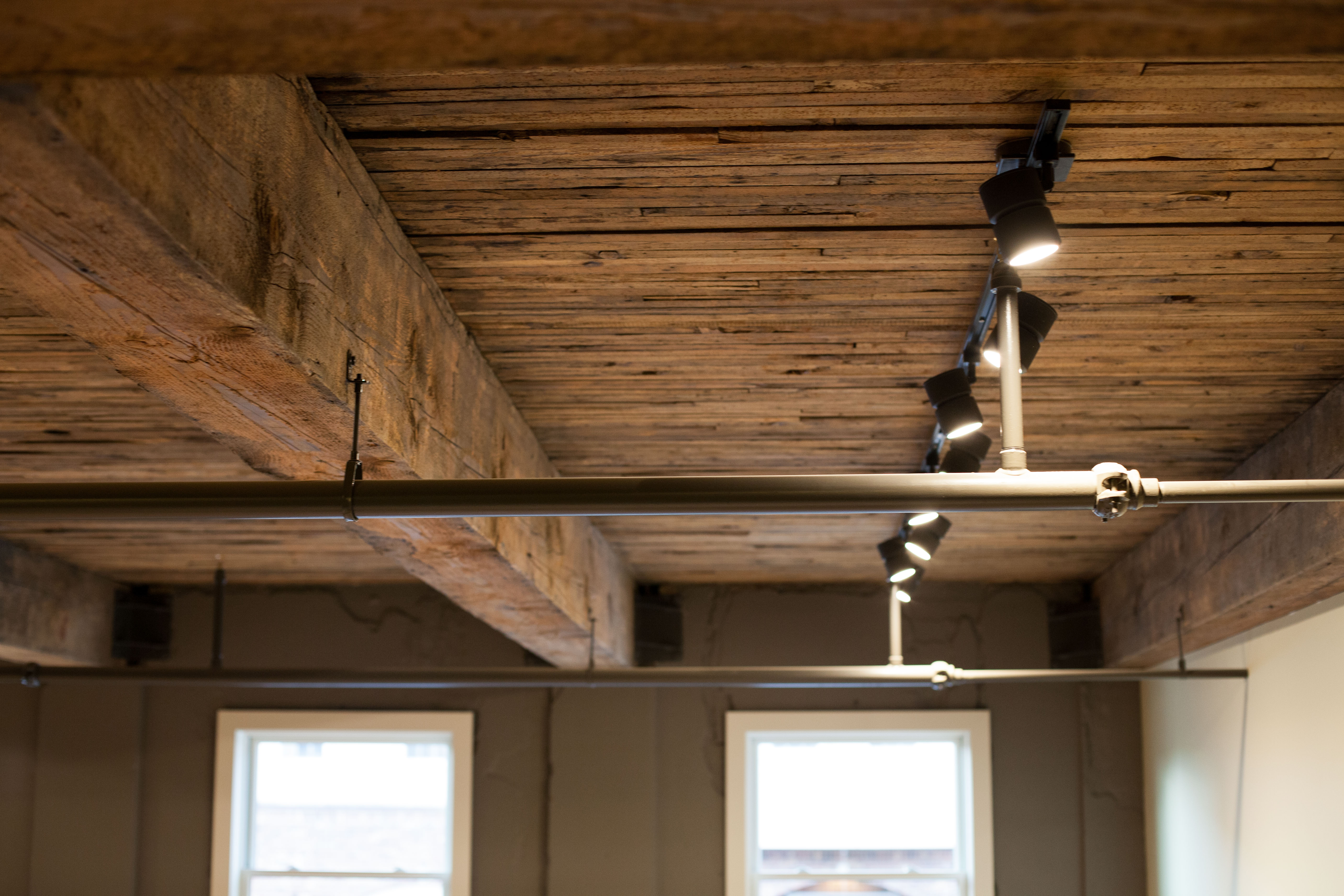 Exposed historic wood ceilings in a Loft Room of the Inn at Lynden.